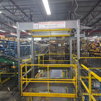 Mezzgate Roly pallet drop safety gate in a warehouse