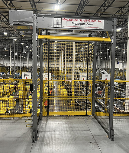 pallet drop safety gate on elevated platform in material handling facility