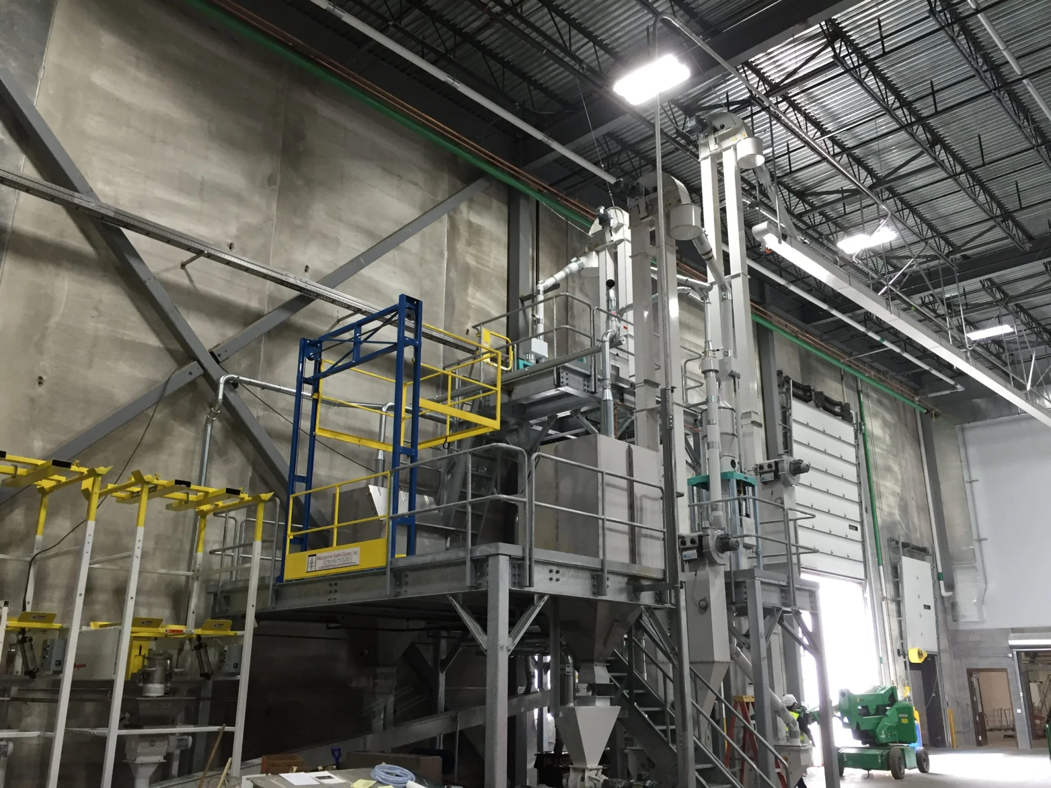 Production platform with a Tri-Side safety gate used for fall protection